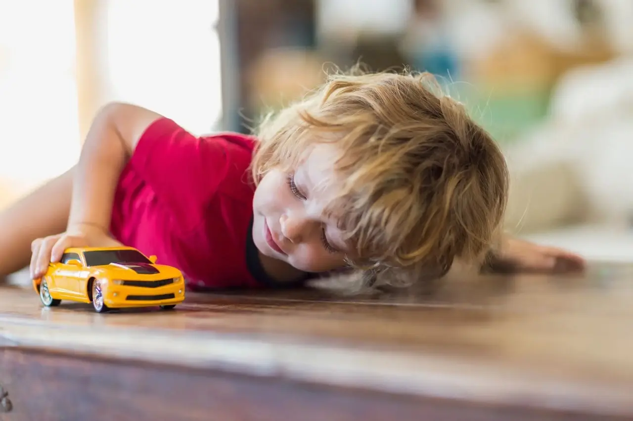 playing with toy cars
